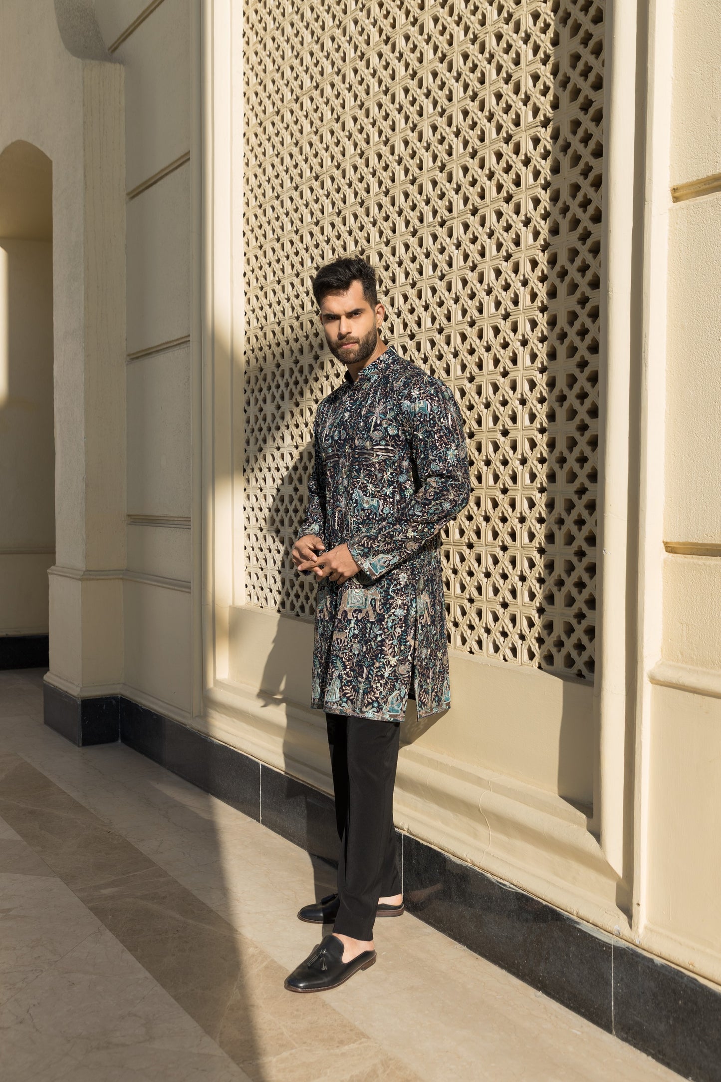 The teal blue kurta with pyjama, made from luxurious georgette fabric