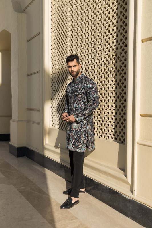 The teal blue kurta with pyjama, made from luxurious georgette fabric