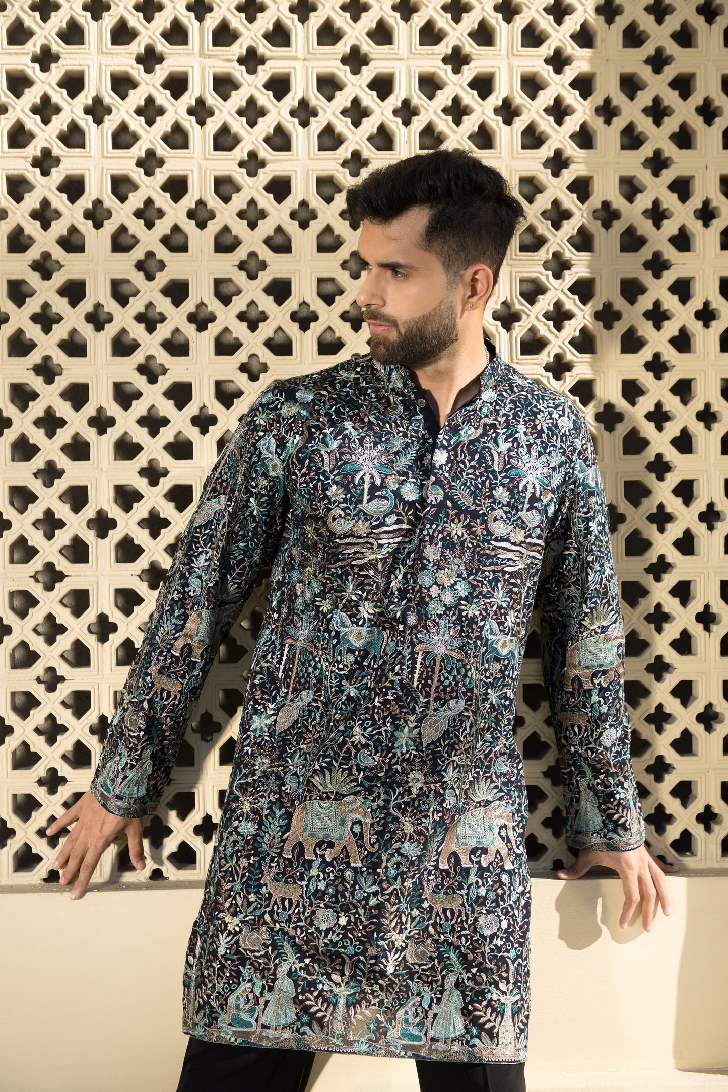 The teal blue kurta with pyjama, made from luxurious georgette fabric