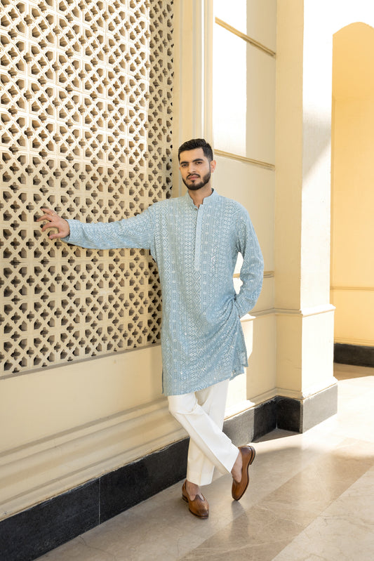 The sky blue Luckhnavi Kurta Pyjama, crafted from elegant georgette fabric