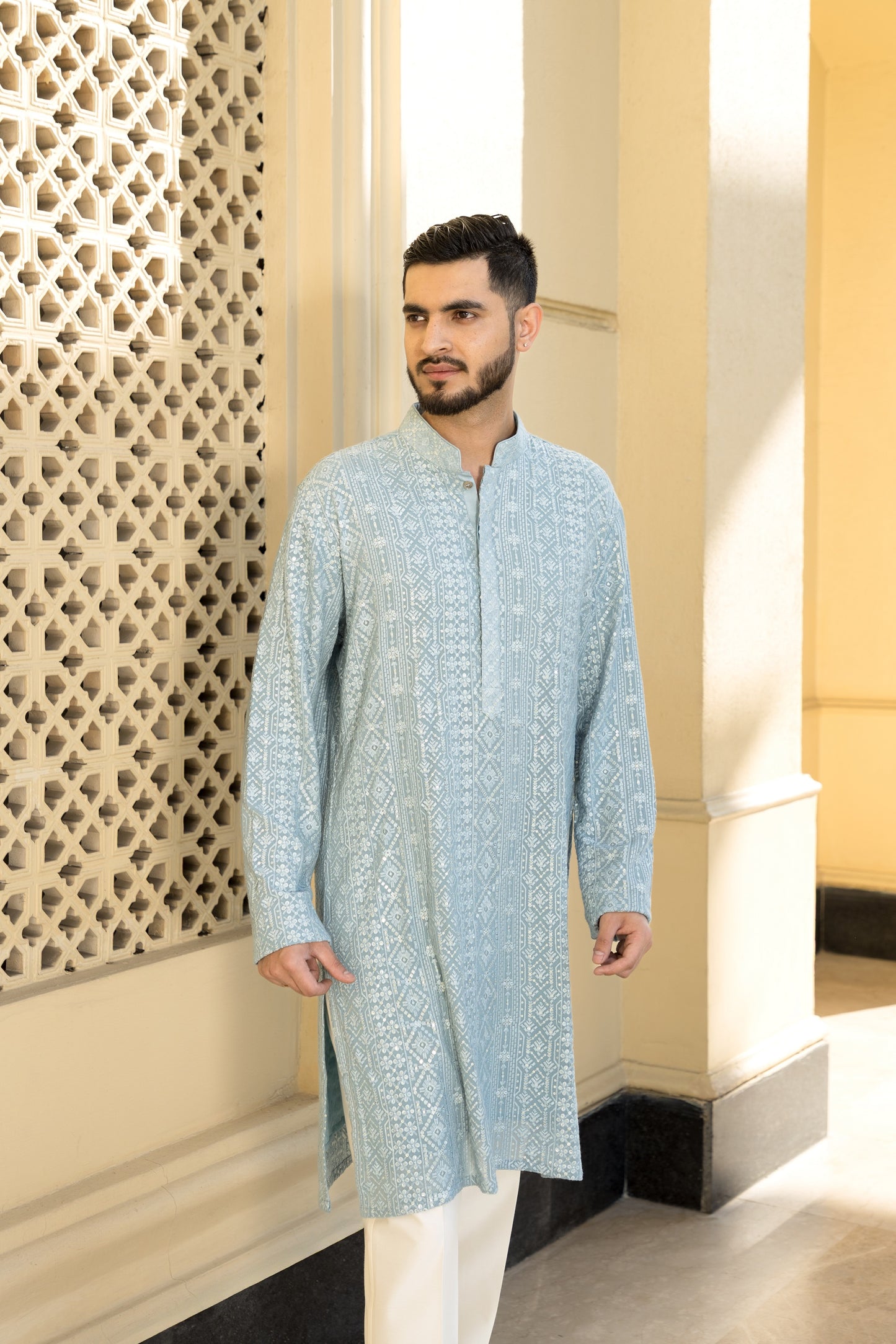 The sky blue Luckhnavi Kurta Pyjama, crafted from elegant georgette fabric