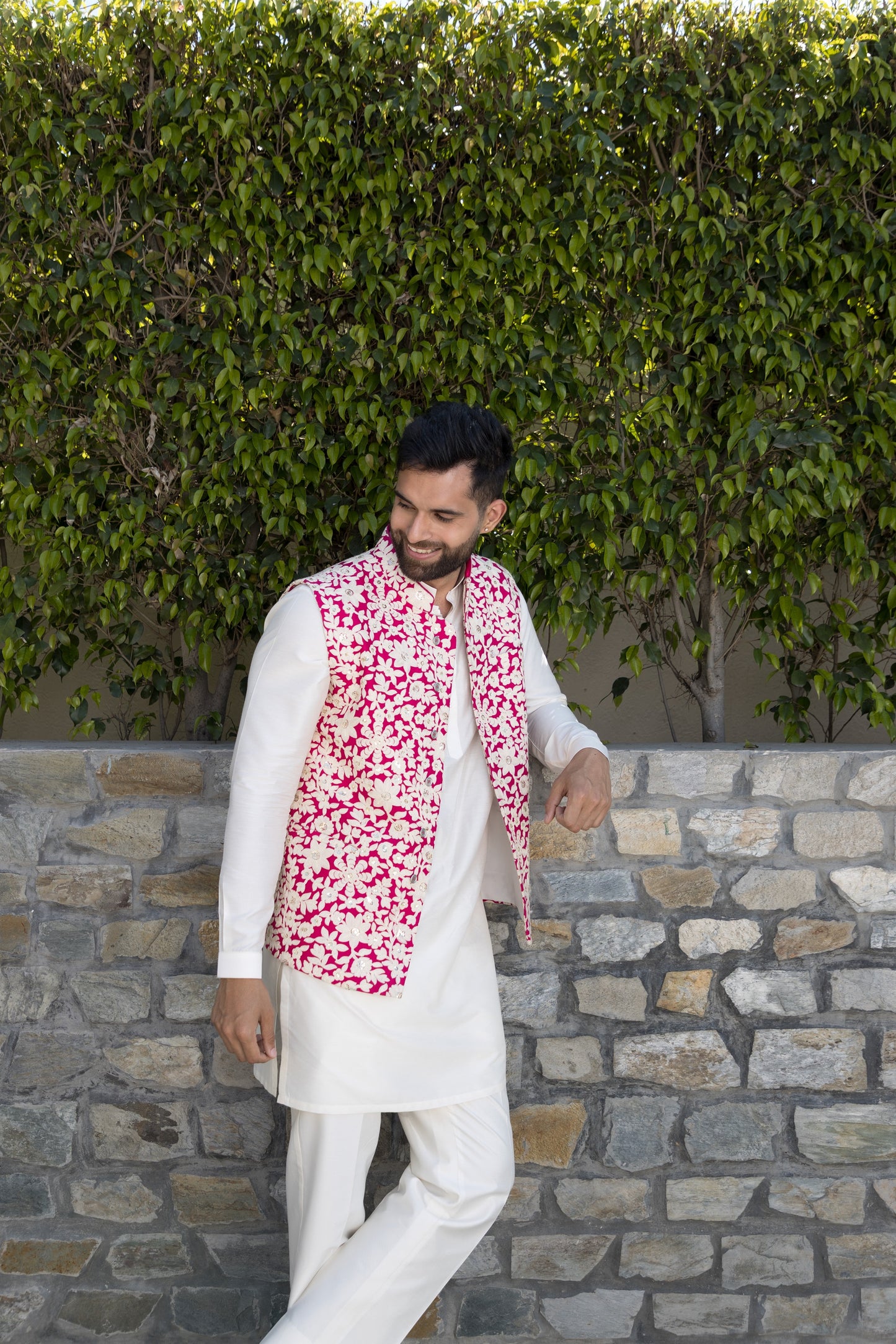 The white and pink bundi set, crafted from luxurious silk fabric,