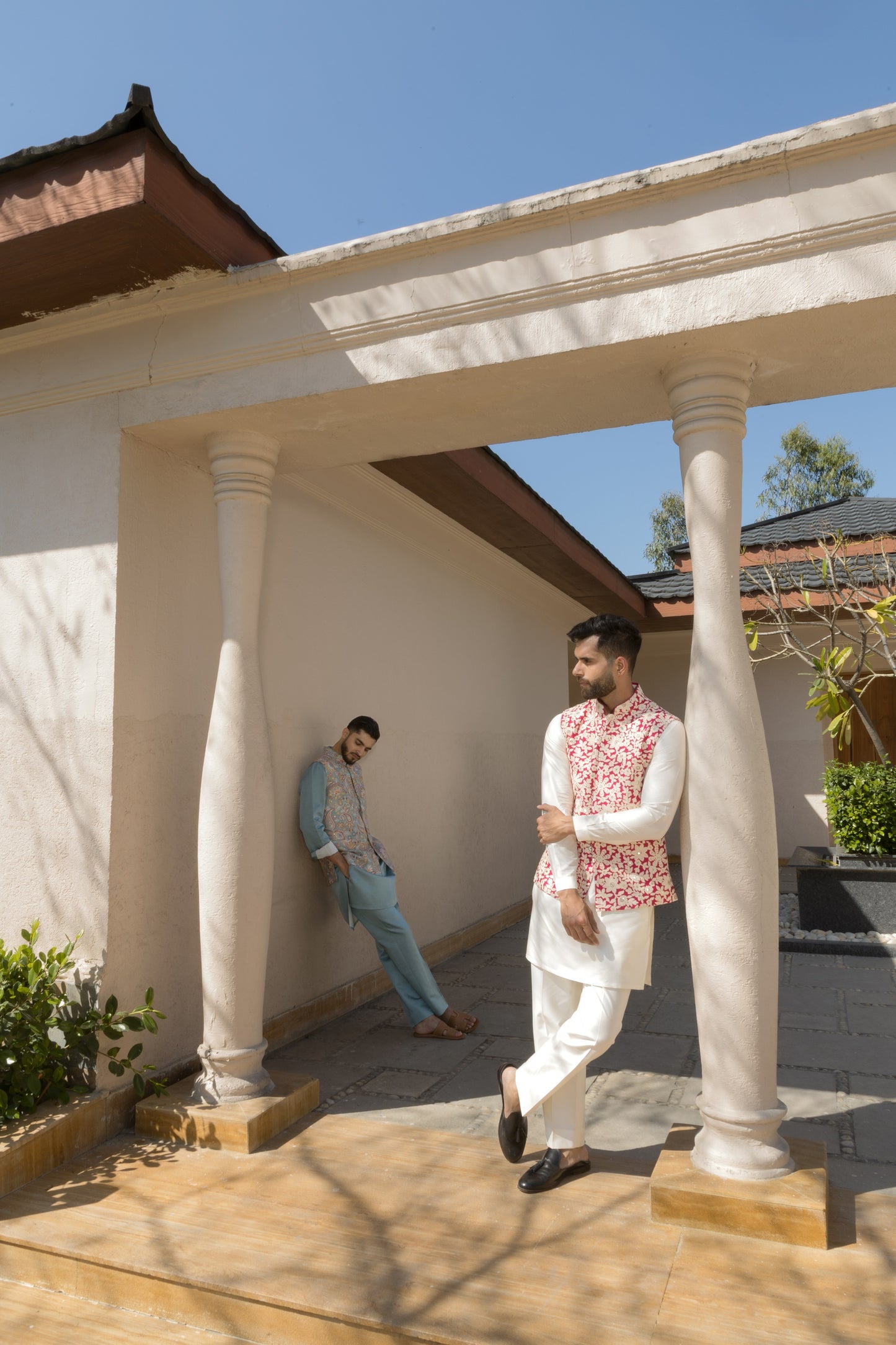 The white and pink bundi set, crafted from luxurious silk fabric,